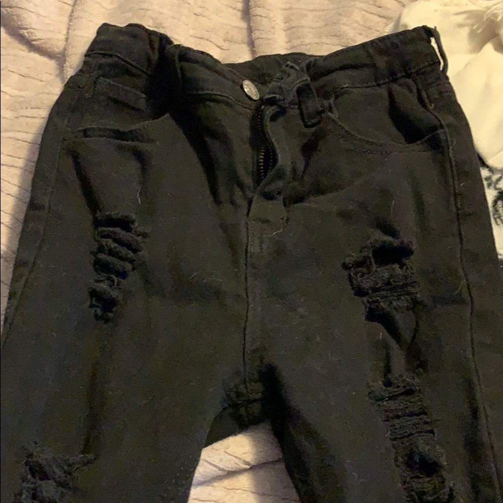 black ripped jeans